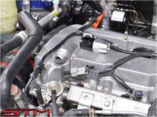 http://www.streettunedmotorsports.com/parts/b/stm_evox_valve_cover_fitting_10_front4.jpg