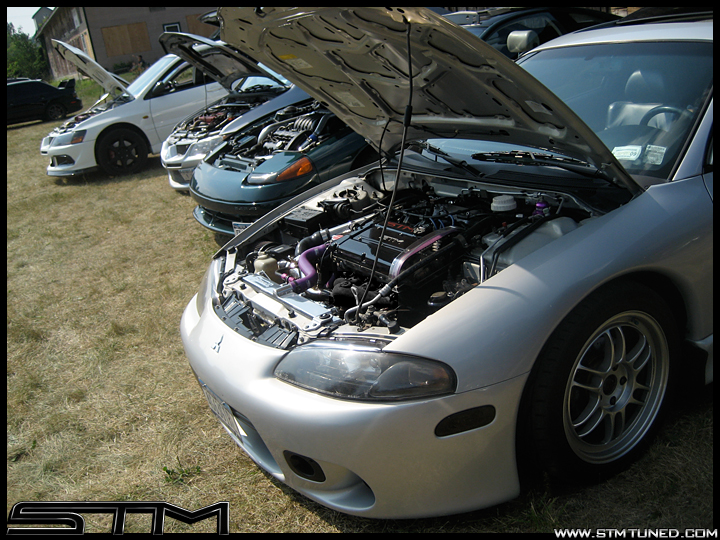 http://www.streettunedmotorsports.com/z/09_dsm_shootout/4g63girl_buschur.jpg