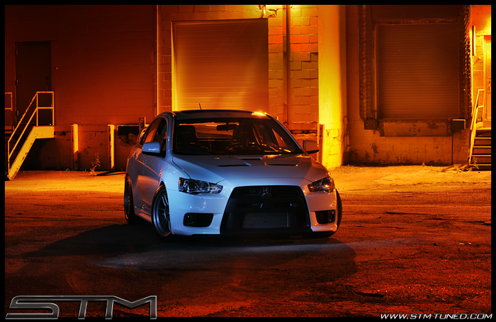 http://www.streettunedmotorsports.com/z/4g63girl/stm_evox_red_night.jpg