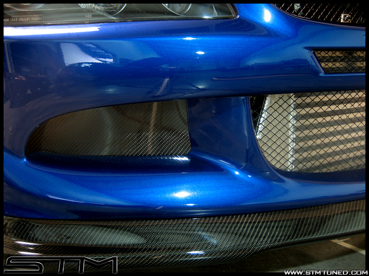 http://www.streettunedmotorsports.com/z/ricer_09/carbon_duct.jpg